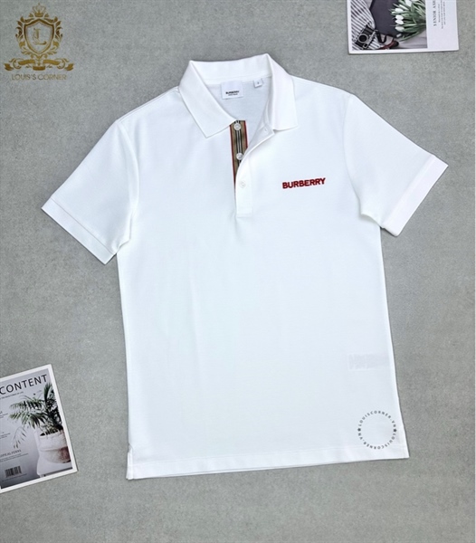 Polo Burberry trắng nẹp khuy tag chữ