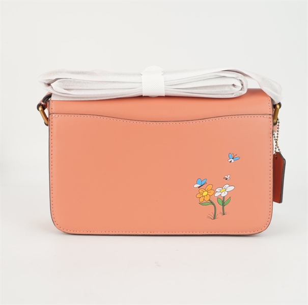 Túi Coach hồng cam hoạt hình +