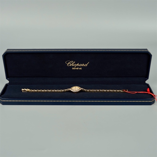 Đồng hồ Chopard mặt tròn vàng đính đá (426721) (HC) +