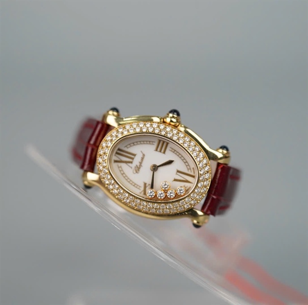 Đồng hồ Chopard mặt oval quai nâu đỏ (1357937) (HC) +