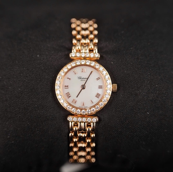 Đồng hồ Chopard mặt tròn màu vàng có giấy kiểm định (584337) sz22 (HC) +