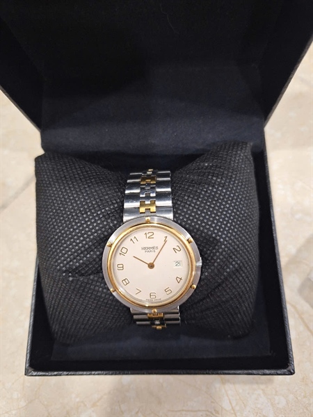 Đồng hồ Hermes bạc mặt tròn viền vàng (378776L) (PN) +