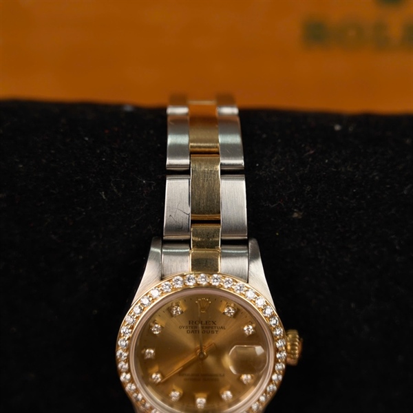 Đồng hồ Rolex mặt tròn đính đá quai bạc 76243 KG+