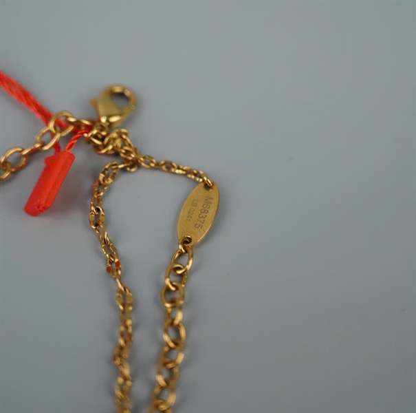 Vòng tay LV vàng KG +