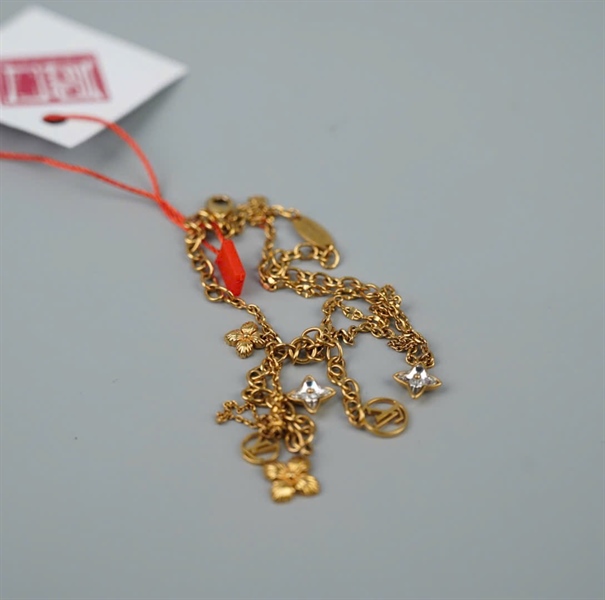 Vòng tay LV vàng KG +