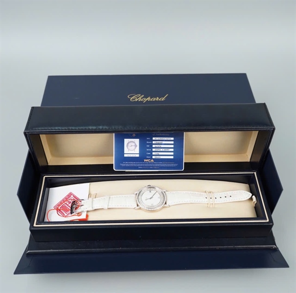 Đồng hồ Chopard mặt tròn quai trắng có giấy kiểm định (604994-C100987) sz34 KG+