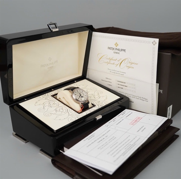 Đồng hồ Patek Philippe Geneve,mặt tròn quai đen Au750 +