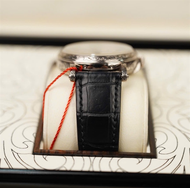 Đồng hồ Patek Philippe Geneve,mặt tròn quai đen Au750 +