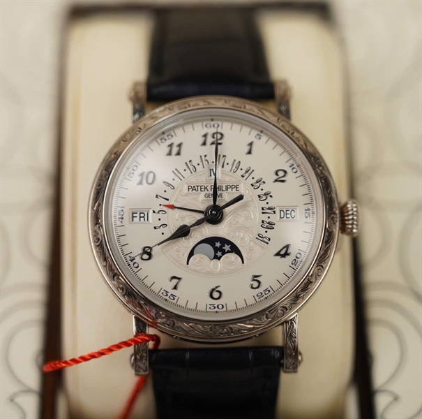 Đồng hồ Patek Philippe Geneve,mặt tròn quai đen Au750 +