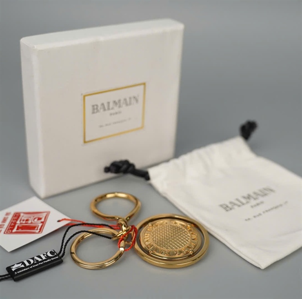 Charm Balmain tròn màu vàng +