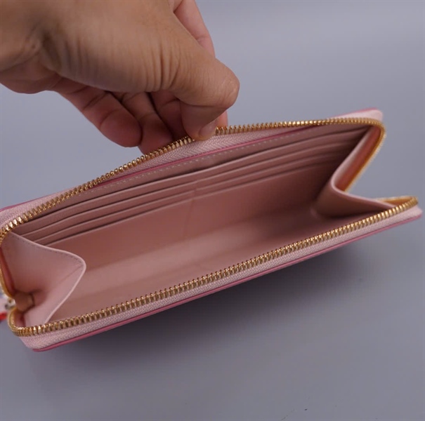 Ví MCM hồng có zip (BQ) KG+