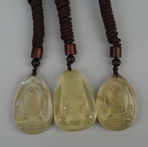 Mặt dây phật thạch anh vàng +