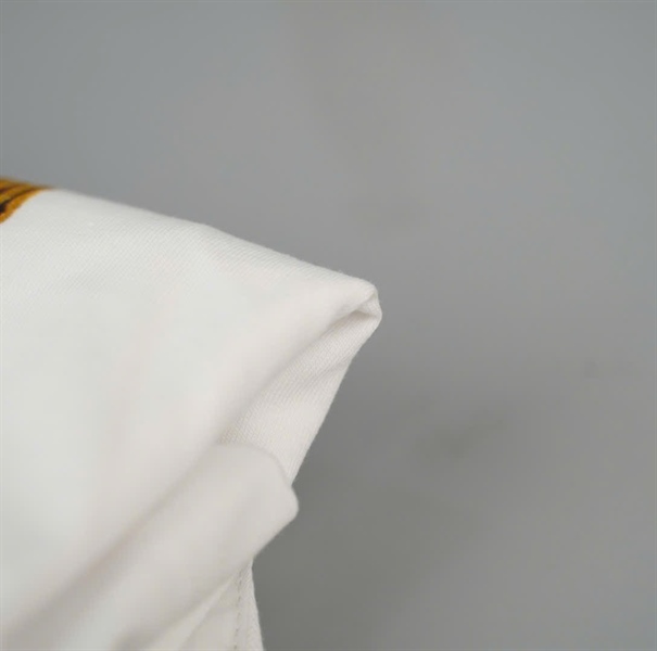 Áo thun Moschino trắng in hình KG+