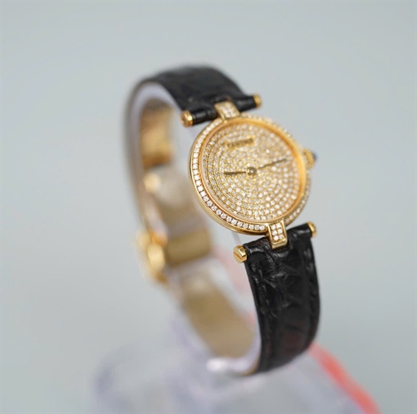 Đồng hồ Cartier dây đen mặt vàng đính đá bộc vàng (580004) (HC) KG+