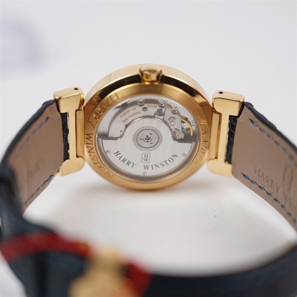 Đồng hồ Harry Winston mặt xanh viền vàng đính đá No0179 (HC) KG+