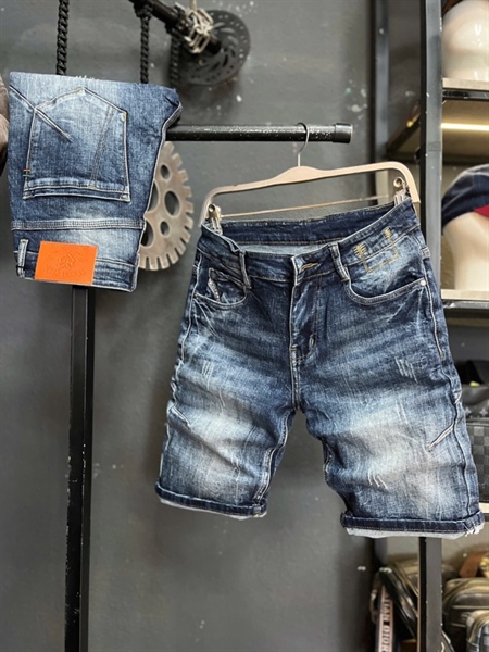 Sort Jean QC- JD8015 xanh was rách mạng xéo túi
