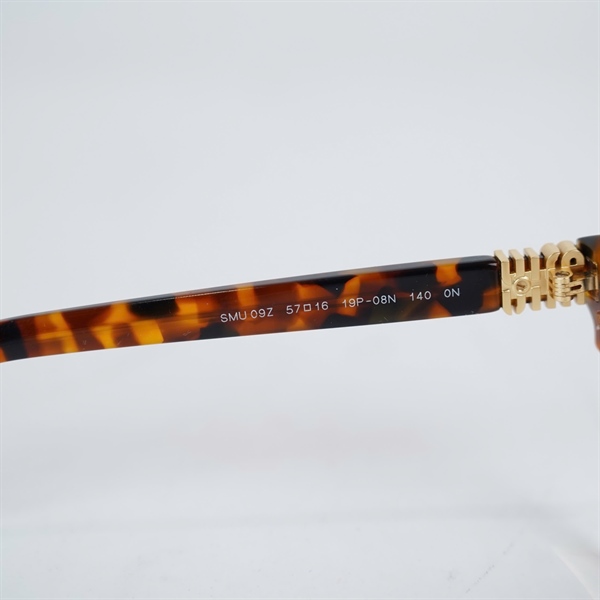 Kính Miu Miu mắt mèo màu đồi mồi SMU09Z (57-16-140) KG+