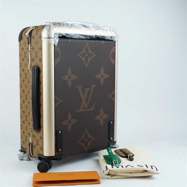 Vali LV hoa nâu kèm 2 champ (HC) +