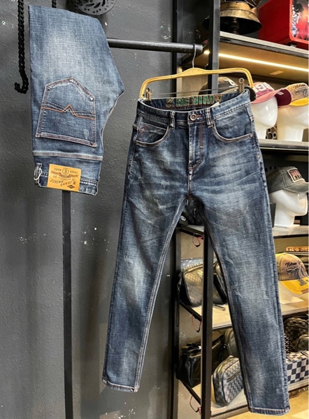 Jean Dài QCCC3K- M8 Slim-Fit xanh was cào nhẹ thêu chỉ cam