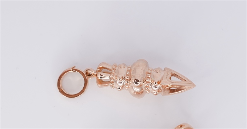 Charm vàng Pháp bảo kim cang M250614 +