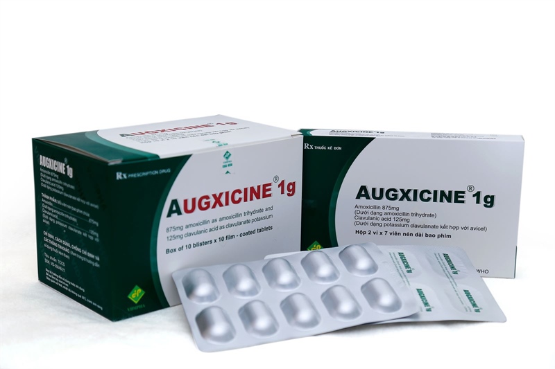 Thuốc Augxicine 1g (Amoxicillin 875mg/clavulanic 125mg) (Hộp 10 vỉ x 10 viên) - Vidipha