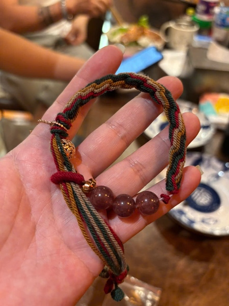 Vòng tay rượu đỏ tết dây 3 hạt +