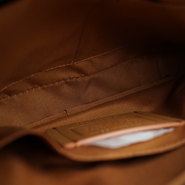 Túi Coach nâu pha đen sz24 (QN) KG+