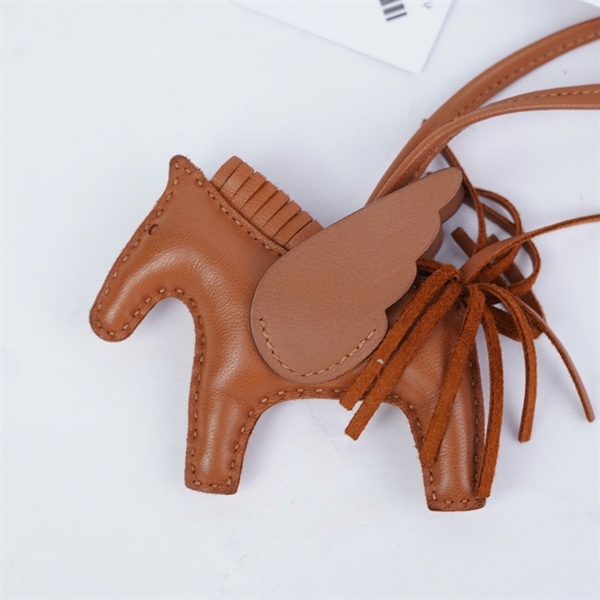 Charm Hermes ngựa nâu (A-T) KG+