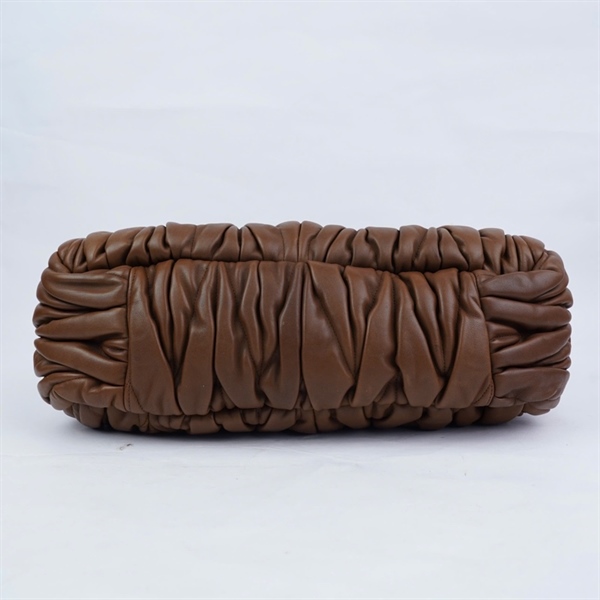 Túi Miu Miu nâu kèm 1 chìa sz36-27 (HN) KG+