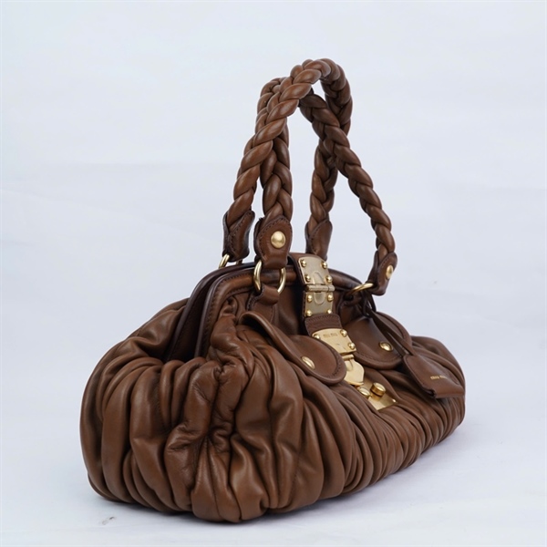 Túi Miu Miu nâu kèm 1 chìa sz36-27 (HN) KG+