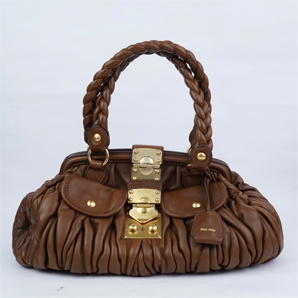 Túi Miu Miu nâu kèm 1 chìa sz36-27 (HN) KG+