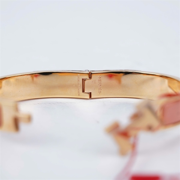 Vòng tay Hermes hồng cam stampQ szPM +