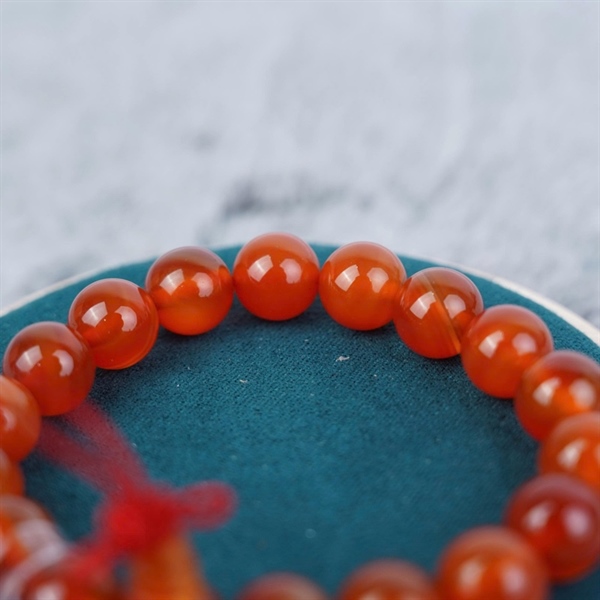 Vòng tay chuỗi hạt nâu đỏ +