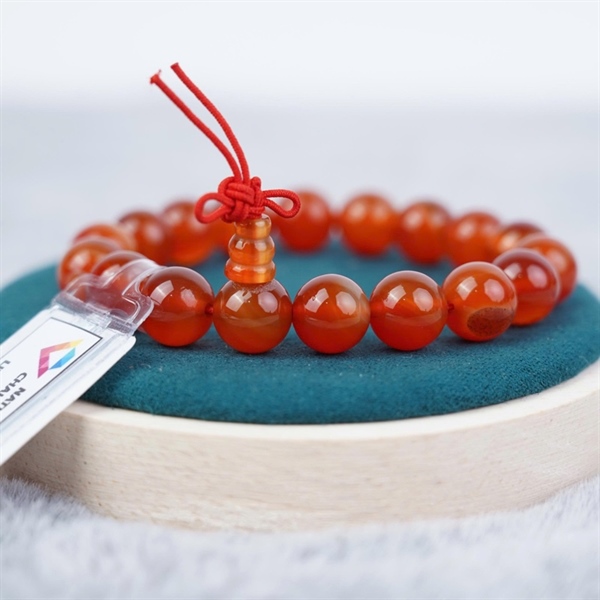 Vòng tay chuỗi hạt nâu đỏ +