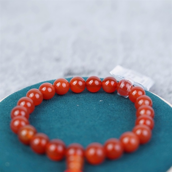 Vòng tay chuỗi hạt nâu đỏ +