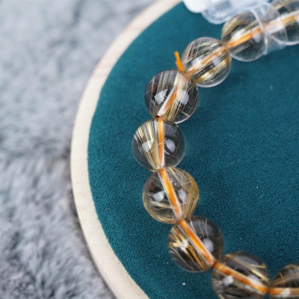 Vòng tay phong thuỷ thạch anh tóc vàng +