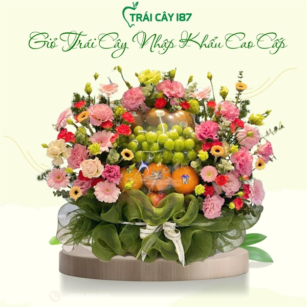 GIỎ TRÁI CÂY LƯỚI XANH LÁ MIX HOA