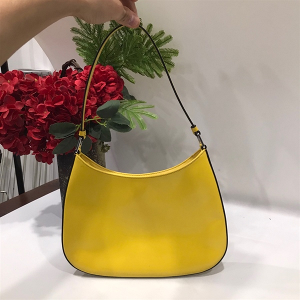 Túi Prada vàng KG+