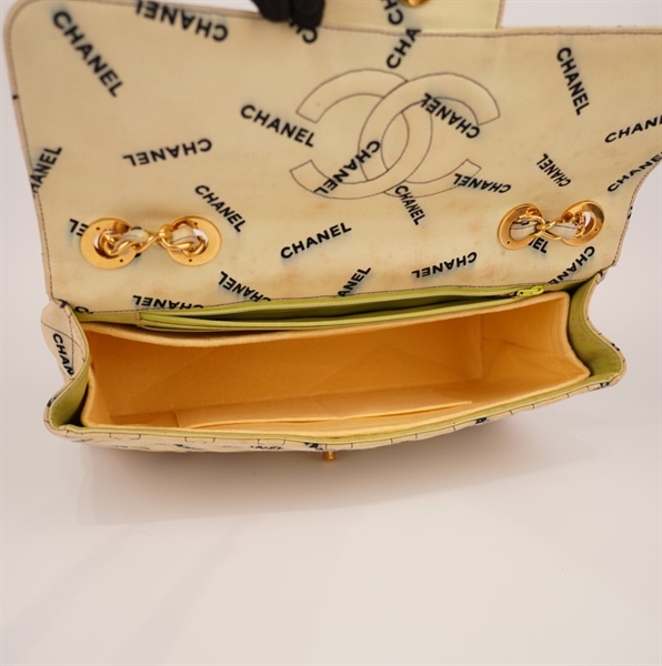 Túi Chanel màu kem chữ đen size 34 KG+
