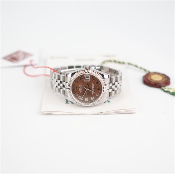 Đồng hồ Rolex bạc mặt tròn màu đồng KG+