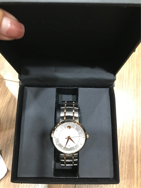 Đồng hồ nam Movado cơ mặt tròn trắng KG+