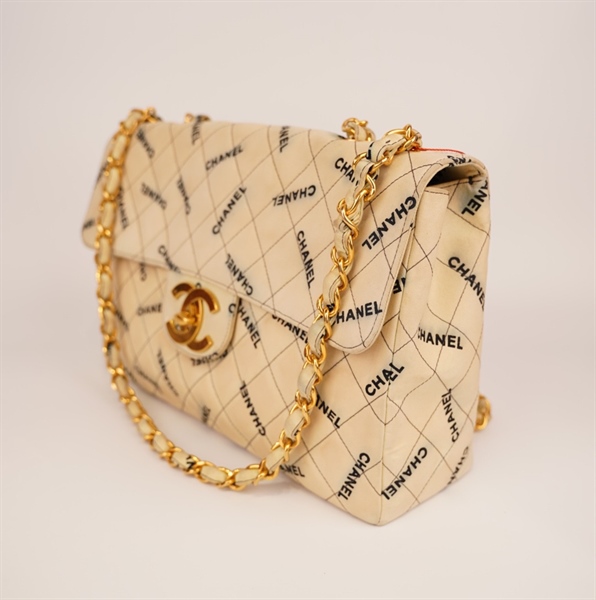 Túi Chanel màu kem chữ đen size 34 KG+