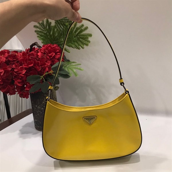 Túi Prada vàng KG+