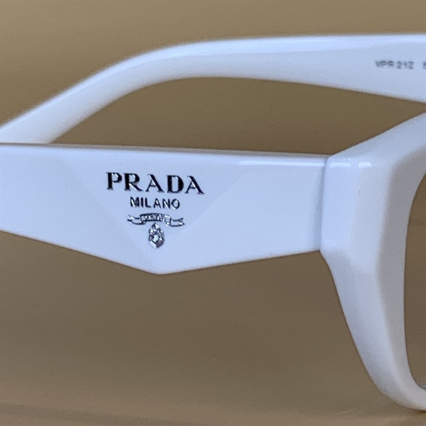 Kính Prada gọng trắng sữa KG+