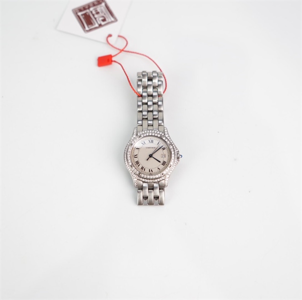 Đồng hồ Cartier bạc mặt tròn viền kim KG+