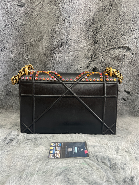 Túi Dior đen đính đinh hoa+