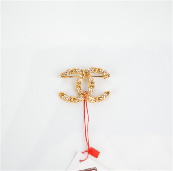 Cài áo Chanel vàng đính đá nhỏ KG+