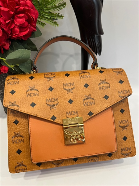 Túi MCM vàng KG+
