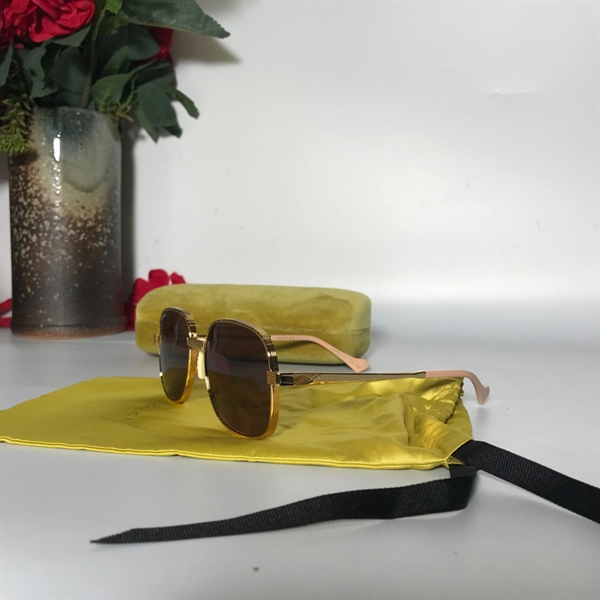 Kính Gucci vàng KG+