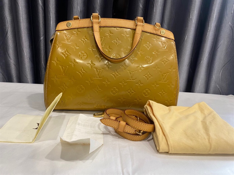 Túi LV vàng nghệ KG+